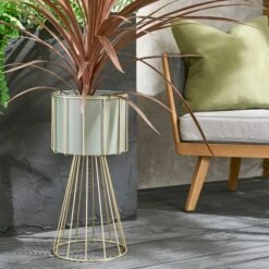 Dunelm Grey Plant Pot On Gold Frame